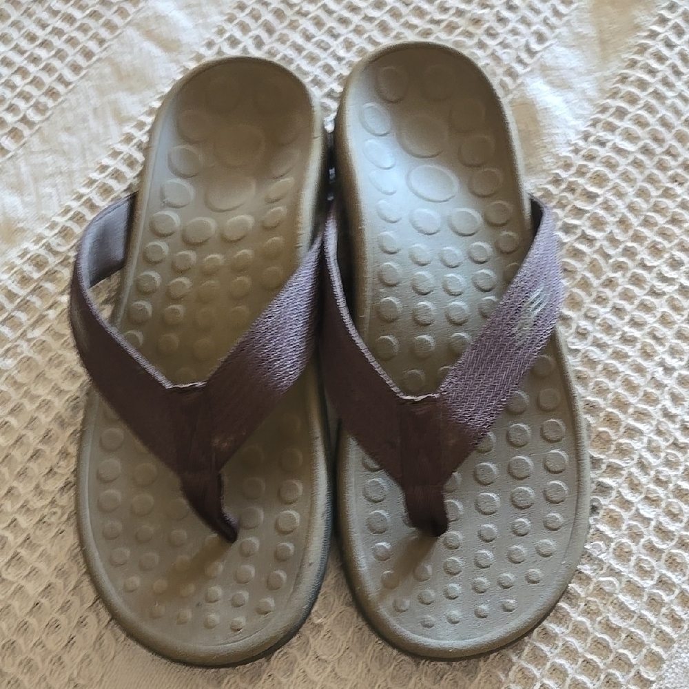 Brown and Tan Flip Flops